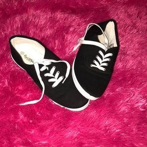 Twisted slip on shoes